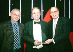 PHOTO: Lifetime Achievement award winner, Malcolm McArthur being presented with his award by Adam Ingram MSP, Minister for Children and Young People and Joe Wilson, SQA Business Manager