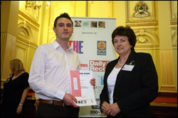 PHOTO: Gavin Stuart, winner of the College Feature Writing Award, being presented with his award by Dr Janet Brown, SQA Chief Executive