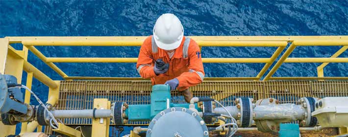 Oil rig worker on platform
