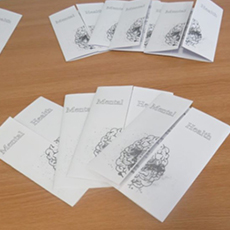 Desk with worksheets on top