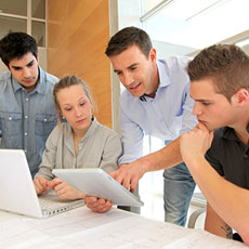 Teacher showing computer